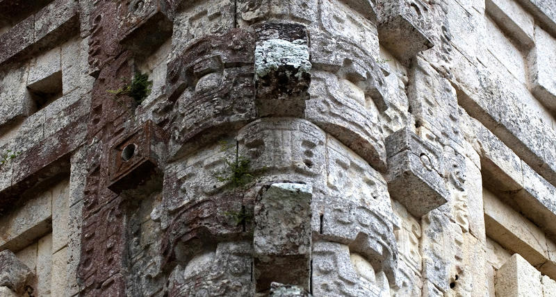 one of the many stone carvings on the myan temple at Uxmal, mexico